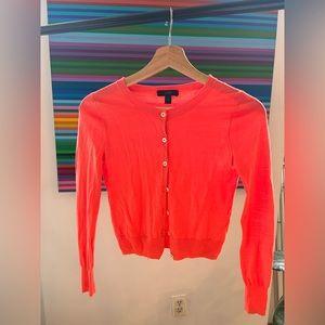 Merino wool cardigan in electric orange